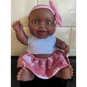 Paola Reina puppegie donker meisje rok met shirt 21cm